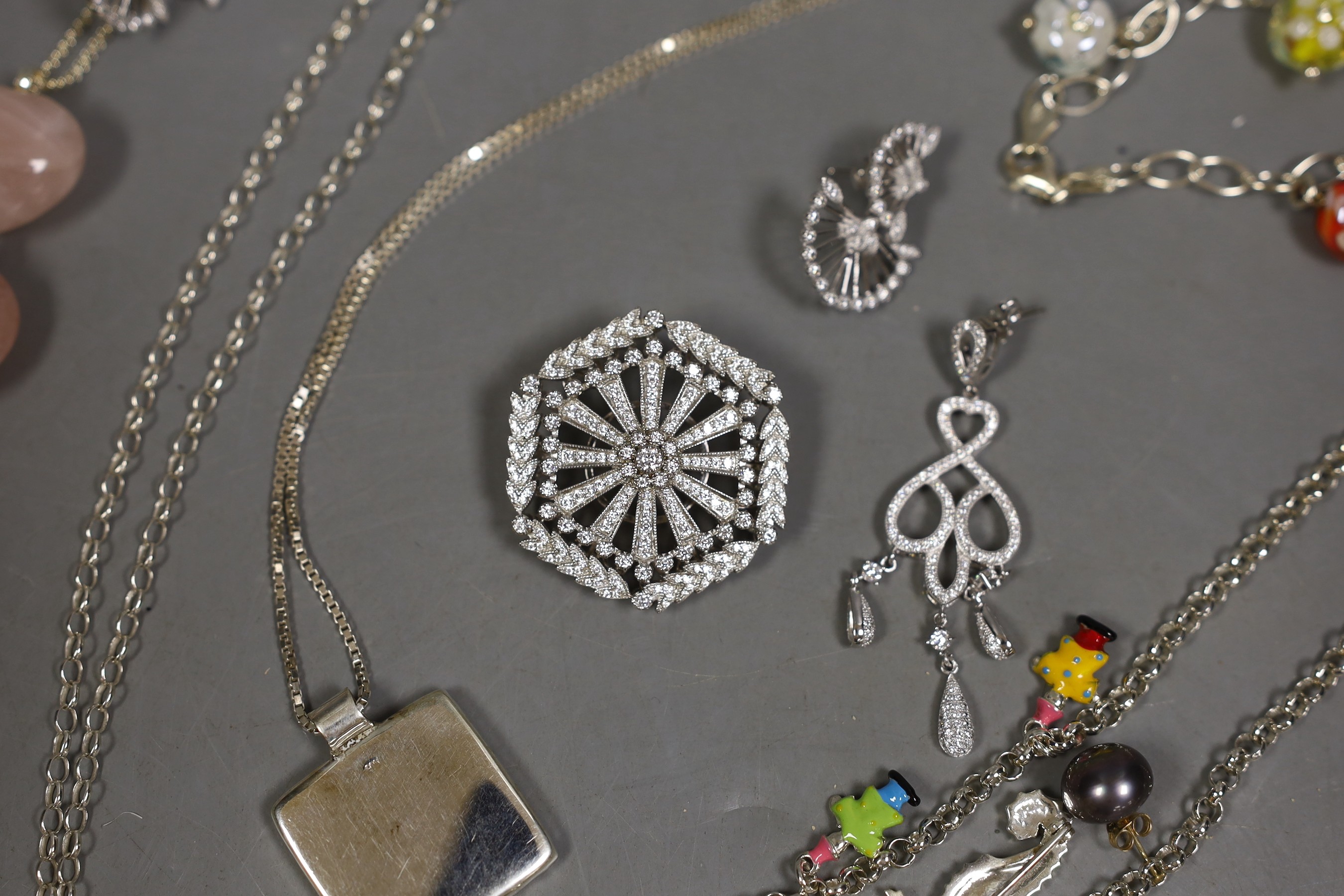 Assorted modern jewellery including four 925, paua shell, freshwater pear and CZ brooches, three assorted pairs of 925 ear studs, a 925 and rose quartz pendant and matching pair of earrings, two pairs of 925 and CZ earri